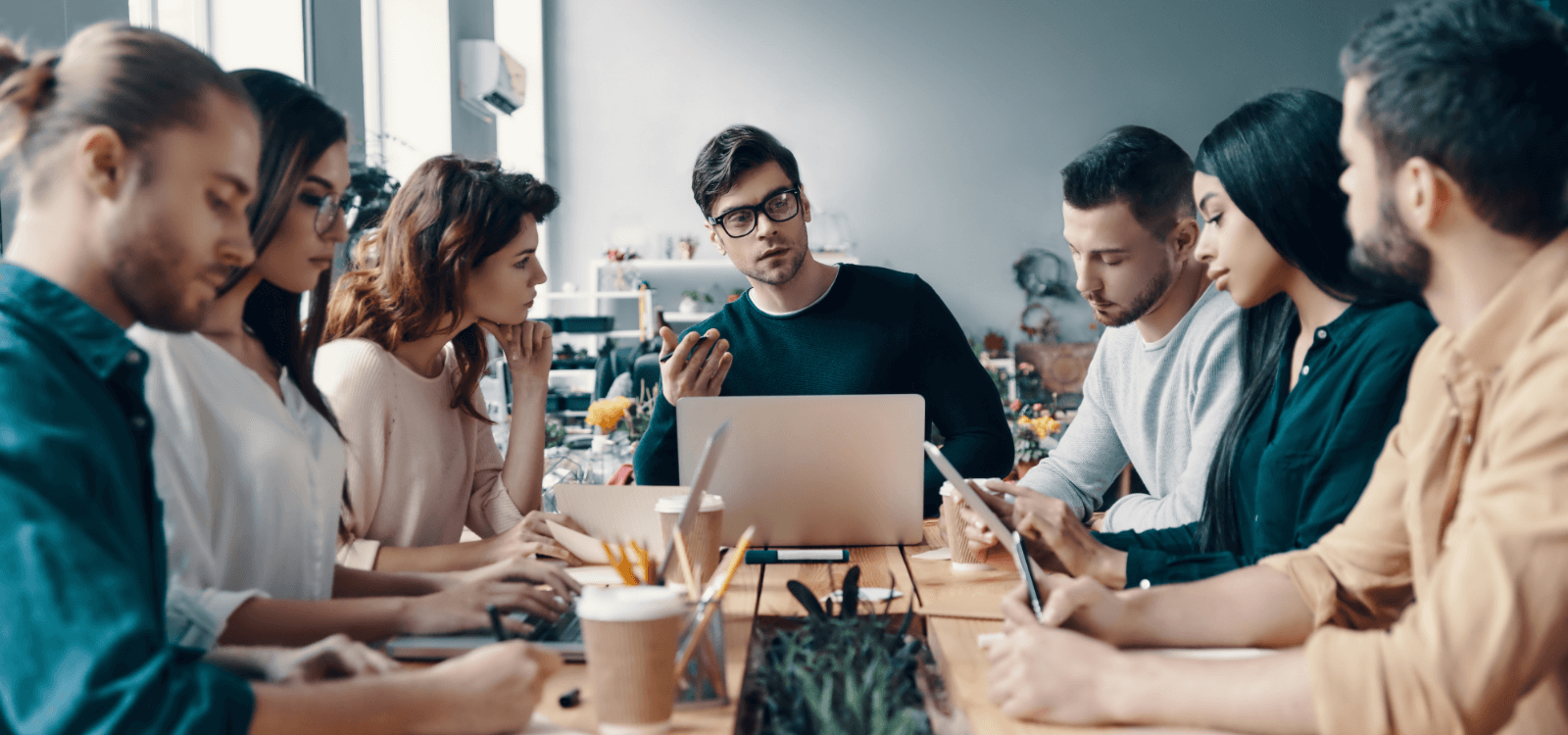 People sitting around a conference table