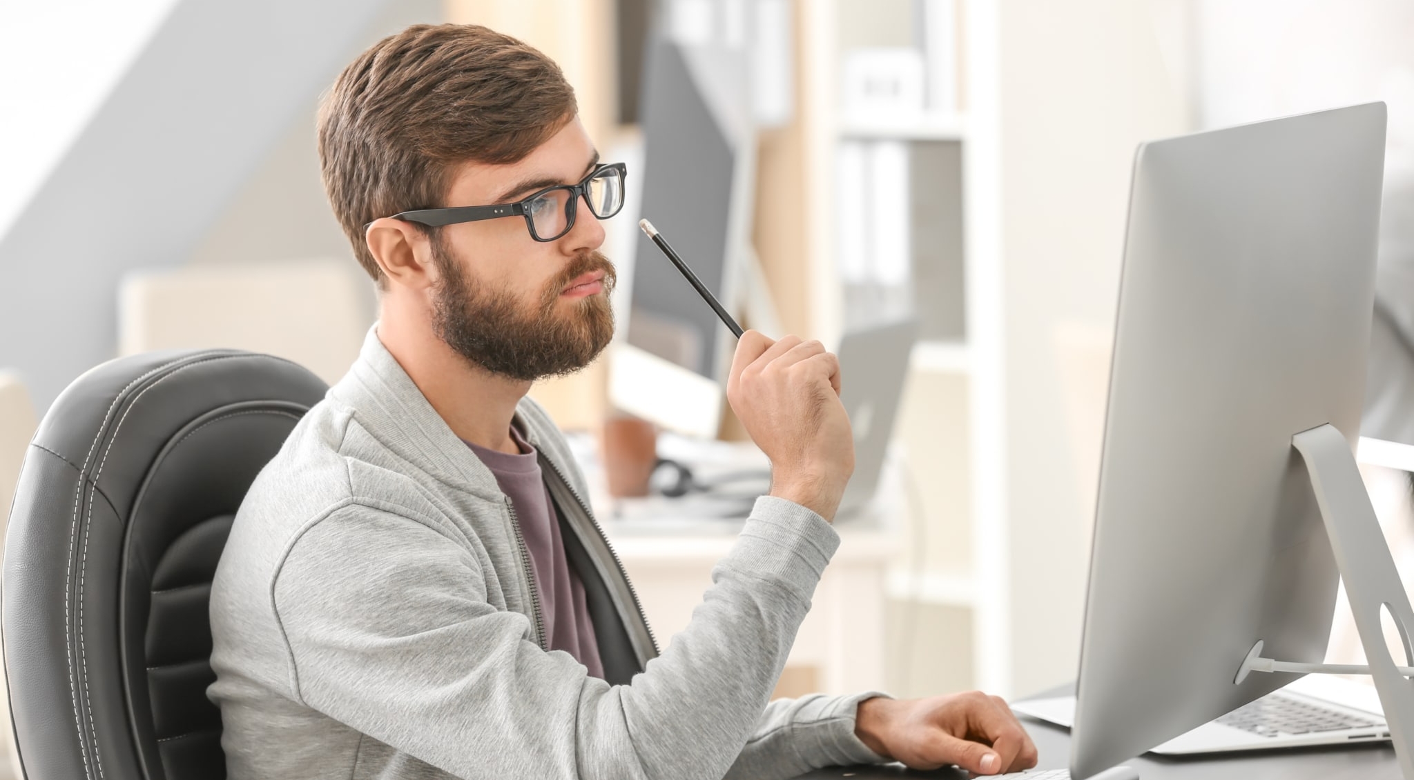 Manager working with computer in office