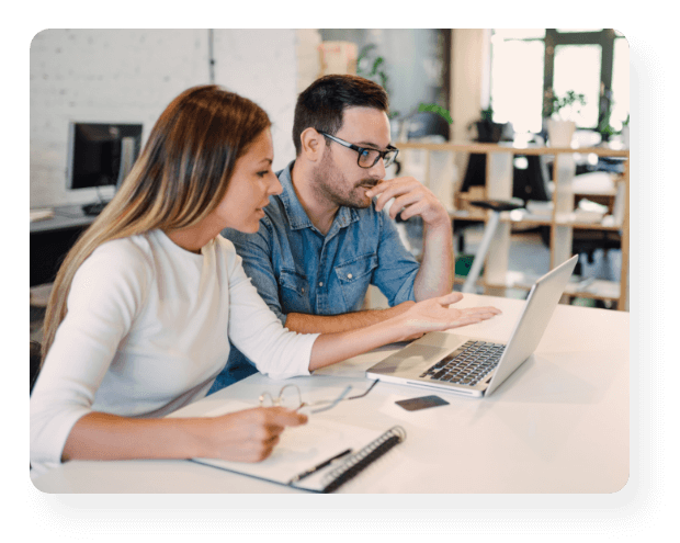 two people working on a laptop together