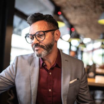 Man with glasses and suit