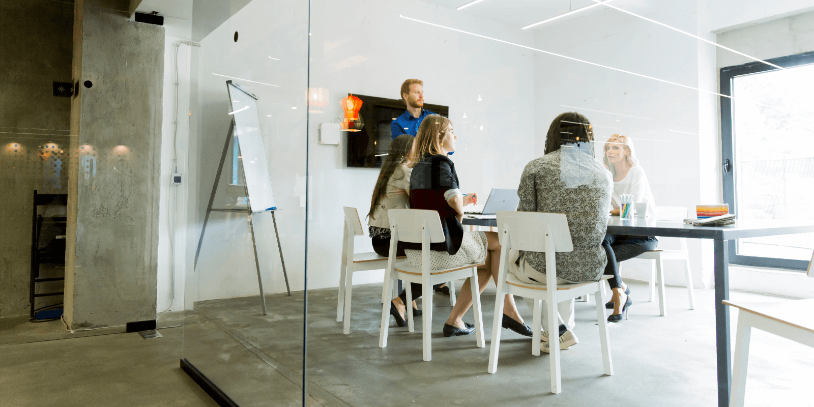 People sitting around a conference table