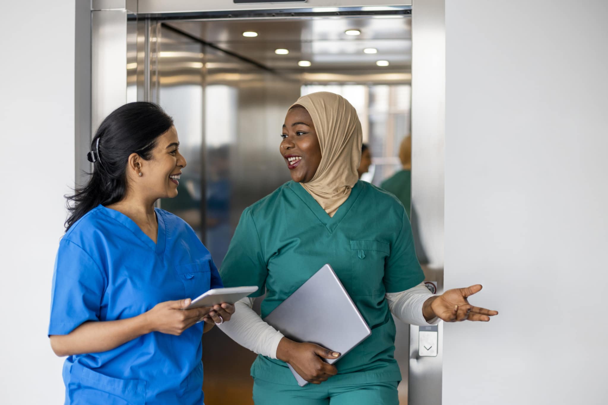 women medical professionals walking