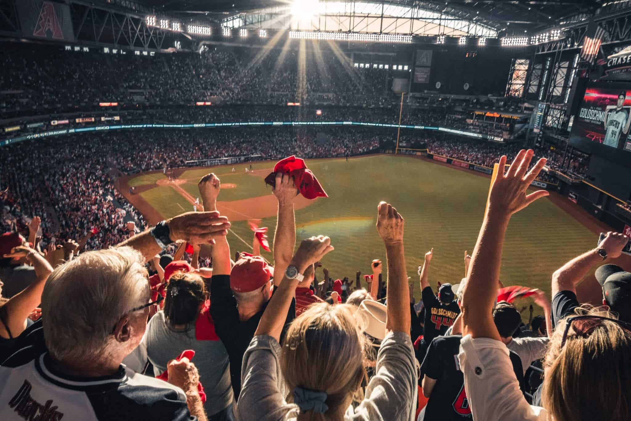 People cheering in a stadium