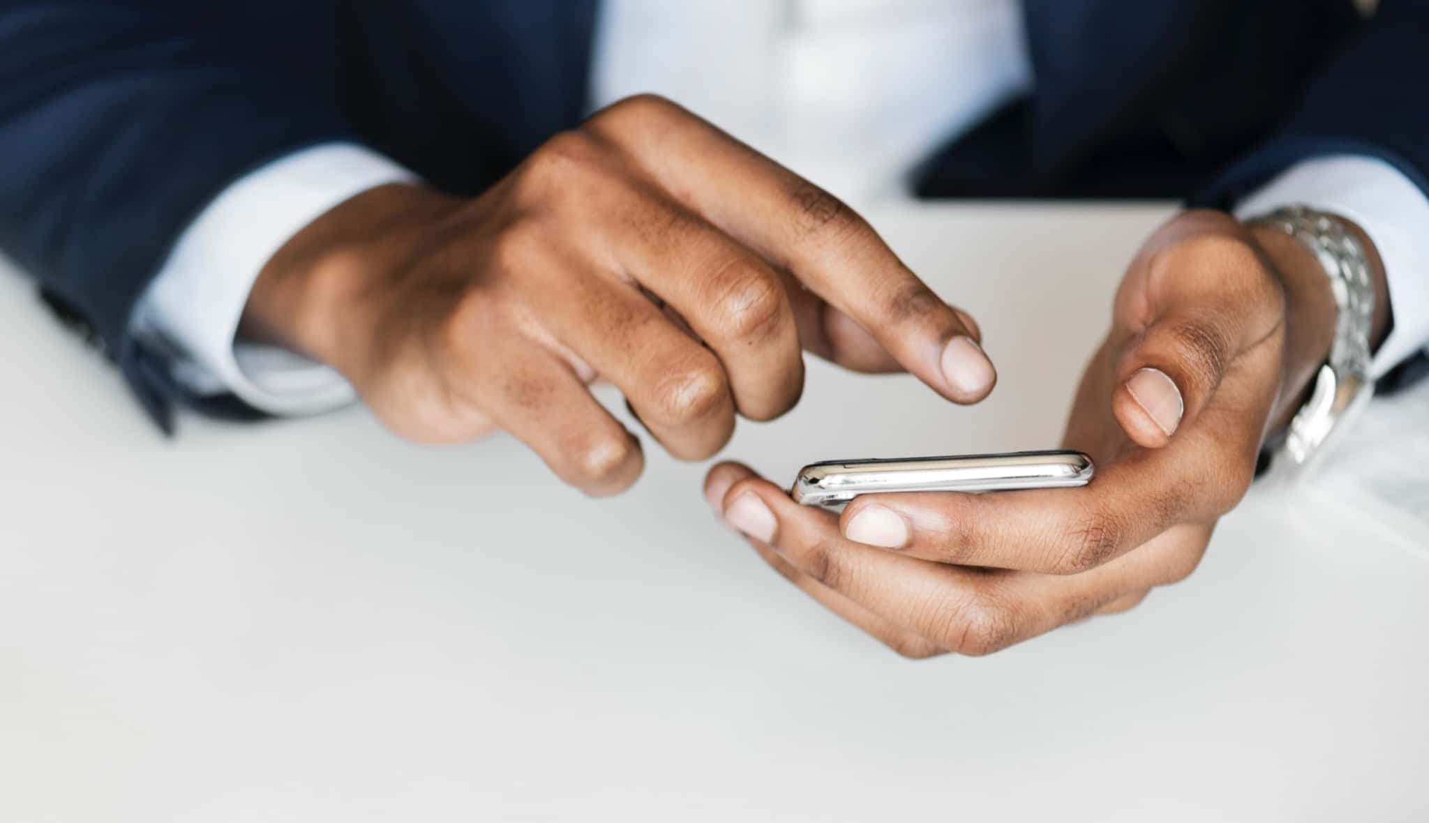 Man hands with a cell phone